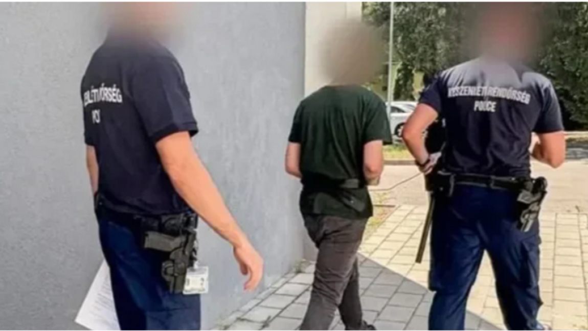 Misstänkta kannibalen grips. Foto: POLICE.HU