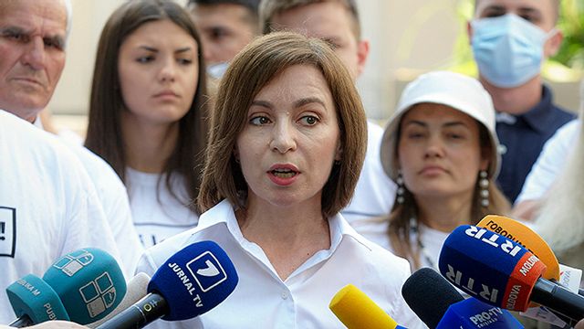 Moldova’s President Maia Sandu speaks to the media after casting her vote in a snap parliamentary election, in Chisinau, Moldova, Sunday, July 11, 2021. Photo: Aurel Obreja/AP