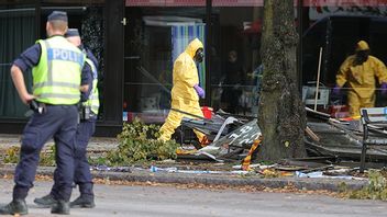 Polisen på plats med tekniker dagen efter den stora explosionen i ett flerfamiljshus på Övre Husargatan i Annedal i centrala Göteborg. Foto: Adam Ihse/TT