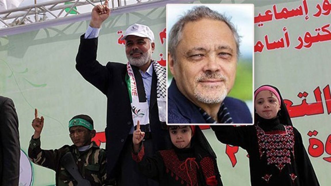 I bakgrunden bild från al-Qassam-brigaderna i Gaza city, i förgrunden Mats Fridlund. Bild: Fars Media Corporation/CC BY 4.0/Göteborgs universitet