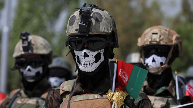 Masked Afghan Army Special Forces attend their graduation ceremony after a three-month training program at the Kabul Military Training Center, in Kabul, Afghanistan. The US and NATO have promised to pay $4 billion a year until 2024 to finance Afghanistan’s military and security forces, which are struggling to contain an advancing Taliban. Already since 2001, the U.S. has spent nearly $89 billion to build, equip and train the forces. Photo: Rahmat Gul/AP/TT