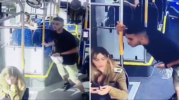 En arabisk ung man spottar på en israelisk officer i uniform. Nu rasar Israels försvarsminister. Foto: X