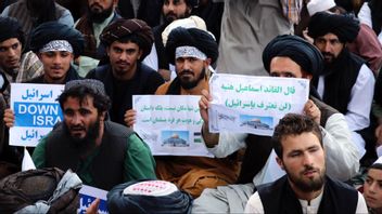 Demonstration i Afghanistan i onsdags kräver ”hämnd” för Israels dödande av hamasledaren Ismail Haniyeh Foto: Omid Haqjoo/AP/TT