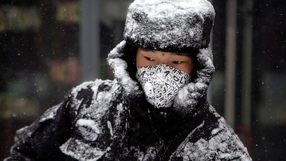 Rekordkyla slår mot Hong Kong, Japan och Sydkorea. Foto: Mark Schiefelbein/AP/TT (akrivbild)