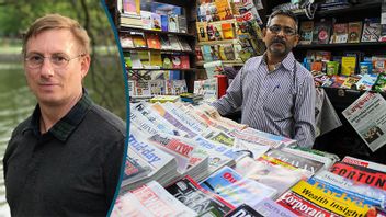 En tidningsförsäljare i Mumbai levererar åsiktspluralism. Foto: Anna Karolina Eriksson/TT