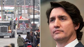 En lastbilskonvoj med förare som protesterar mot vaccinkrav kör genom samhället Kakabeka Falls i Ontarioprovinsen i Kanada. Justin Trudeau är mycket kritisk till förarna. Arkivbild. Foto: Adrian Wyld/David Jackson/AP/TT