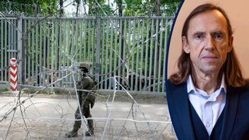 En polsk soldat patrullerar gränsen mot Vitryssland där Polen de senaste åren byggt ett 5,5 meter högt och 186 kilometer långt stålstaket för att hindra illegal migration. Foto: Czarek Sokolowski/AP/TT 