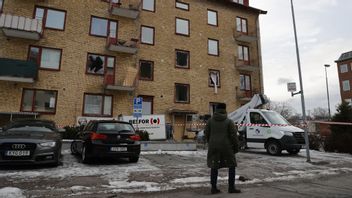 Dagen efter explosionen vid en port till ett flerfamiljshus i Mölndal. Foto: ADAM IHSE/TT