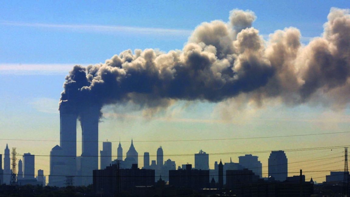 In this Sept. 11, 2001 photo, as seen from the New Jersey Turnpike near Kearny, N.J., smoke billows from the twin towers of the World Trade Center in New York after airplanes crashed into both towers. Photo: Gene Boyars/AP/TT