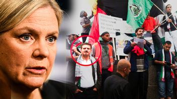 Jamal El-Haj har vid en demonstration i Malmö poserat vid två Hamasflaggor. Magdalena Andersson har återkommande försvarat honom. Foto: Facebook/Fredrik Sandberg/TT