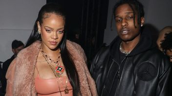 Artistparet Rihanna och Asay Rocky på en modemässa i februari. Foto: Vianney Le Caer/AP/TT