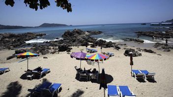 Vaccinerade turister i Phuket kan slippa karantän, så länge de stannar i ett och samma område. Foto: Sakchai Lalit/AP/TT