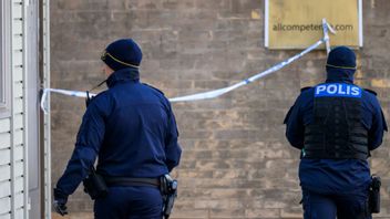 Polis och kriminaltekniker vid Vougts väg i Malmö där skottlossningen ägde rum. Foto: Johan Nilsson/TT