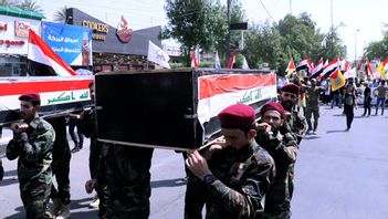 Sommaren 2021 dödades milismän från den proiranska gruppen Hashed al-Shaabi i ett amerikanskt flyganfall mot förläggningar i Irak som användes av gruppen. Natten till lördagen tros gruppen, nu en del av den irakiska armén, ha varit mål för en attack från luften mot en bas i södra Irak. USA förnekar inblandning. Arkivbild. Foto: Khalid Mohammed/AP/TT