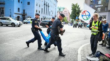 Bilden är från en annan klimatprotest och personen på bilden är inte den friande forskaren. Foto: Henrik Montgomery/TT.