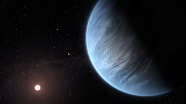 Illustration av K2-18b (till höger). Bild: ESA/Hubble/CC BY-SA 4.0