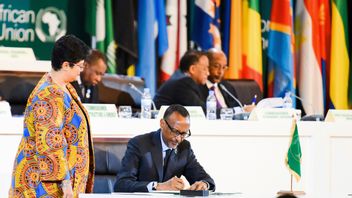 Rwandas president, och dåvarande ordförande för African Union, Paul Kagame när han skrev på avtalet om African Continental Free Trade Area, år 2018. Foto: Stringer