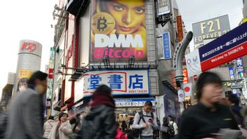 Reklam för handel med bitcoin i Tokyo i Japan. Arkivbild, Shizuo Kambayashi/AP/TT.