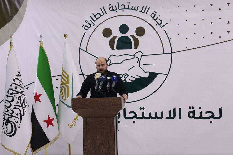 Mohammed al-Bashir vid en presskonferens i Idlib i slutet av november. Foto: Omar Haj Kadour/AP/TT