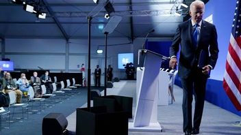 USA:s president Joe Biden kritiserar Kinas ledare Xi Jinping för att inte närvara vid klimatmötet i Glasgow. Foto: Evan Vucci/AP/TT