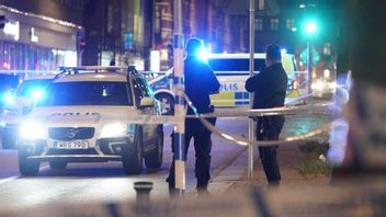Poliser på Bergsgatan i centrala Malmö den 1 maj efter ett misstänkt mordförsök. Arkivbild. Foto: Johan Nilsson/TT.
