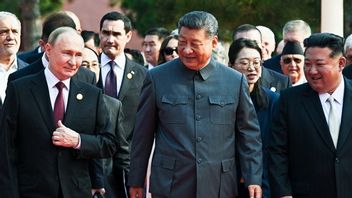 Vladimir Putin, Xi Jinping och Kim Jong-Un. Foto: AP