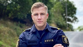 Fredrik Kärrholm i polisuniform. Han kandiderar till riksdagen för Moderaterna i valet 2022. Foto: Karrholm.se