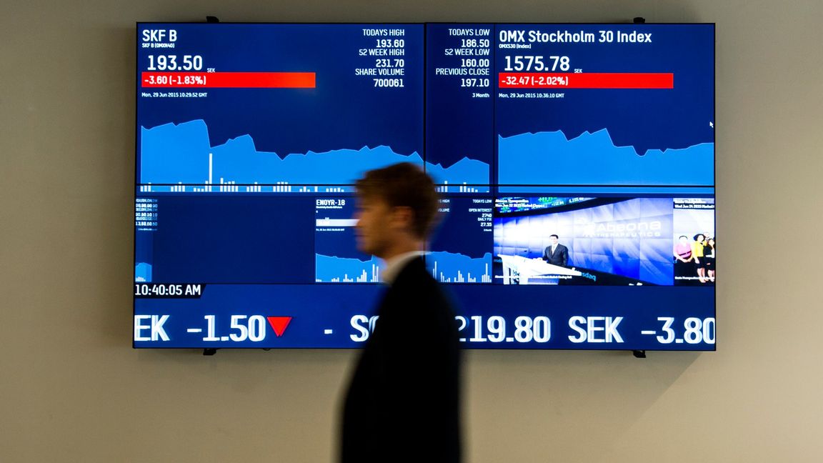 Bild på fallande börskurs på bildskärm inne på Nasdac-börsen i Stockholm. Foto Pontus Lundahl / TT