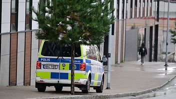 Polisbil vid Elbits lokal i Göteborg efter skottlossning i oktober. Bild: Björn Larsson Rosvall/TT 