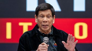 Rodrigo Duterte talar för filippinska gästarbetare i Hongkong den 9 mars. Bild: AP Photo/Vernon Yuen
