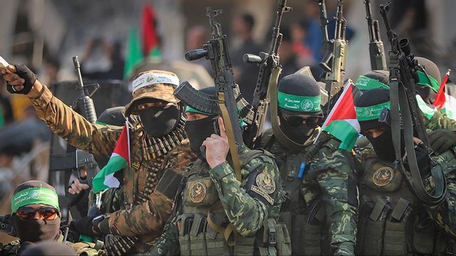 Hamas-terrorister. Foto: Mohammed Hajjar/AP/TT
