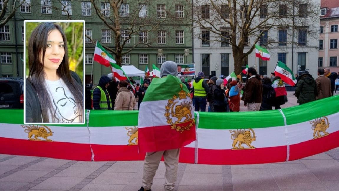 En demonstrant bär Irans förrevolutionära flagga, med Pahlavidynastins lejon. Photo credit: 