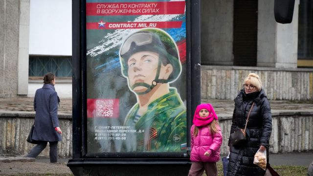 Reklamskylt för att gå med i armén. Foto: AP/TT