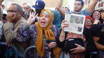Fransmannen Hervé Gourdel hyllades under en samling vid stora moskén i Paris i Frankrike 2014. Foto: Remy de la Mauviniere/TT. 