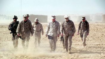 This November 2011 photo shows Gen. James Amos, commandant of the Marine Corps, in Helmand province in southern Afghanistan. It took only two months for U.S. invaders to topple the Taliban in Afghanistan in 2001, a seemingly tidy success against a government that had given refuge to 9/11 mastermind Osama bin Laden. Twenty years later, the United States is withdrawing — visions of victory long vanished and an ascendant Taliban arguably within reach of restoring their rule. Afghanistan proved to be a lesson in the limits of America’s military power. Photo: Robert Burns/AP