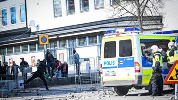 Polis på plats i Rinkeby under demonstration. Foto: Henrik Montgomery/TT